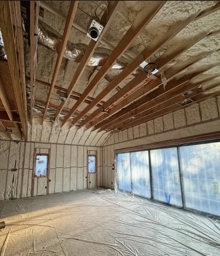 Interior walls and ceiling insulated with spray foam during new construction in Box Elder